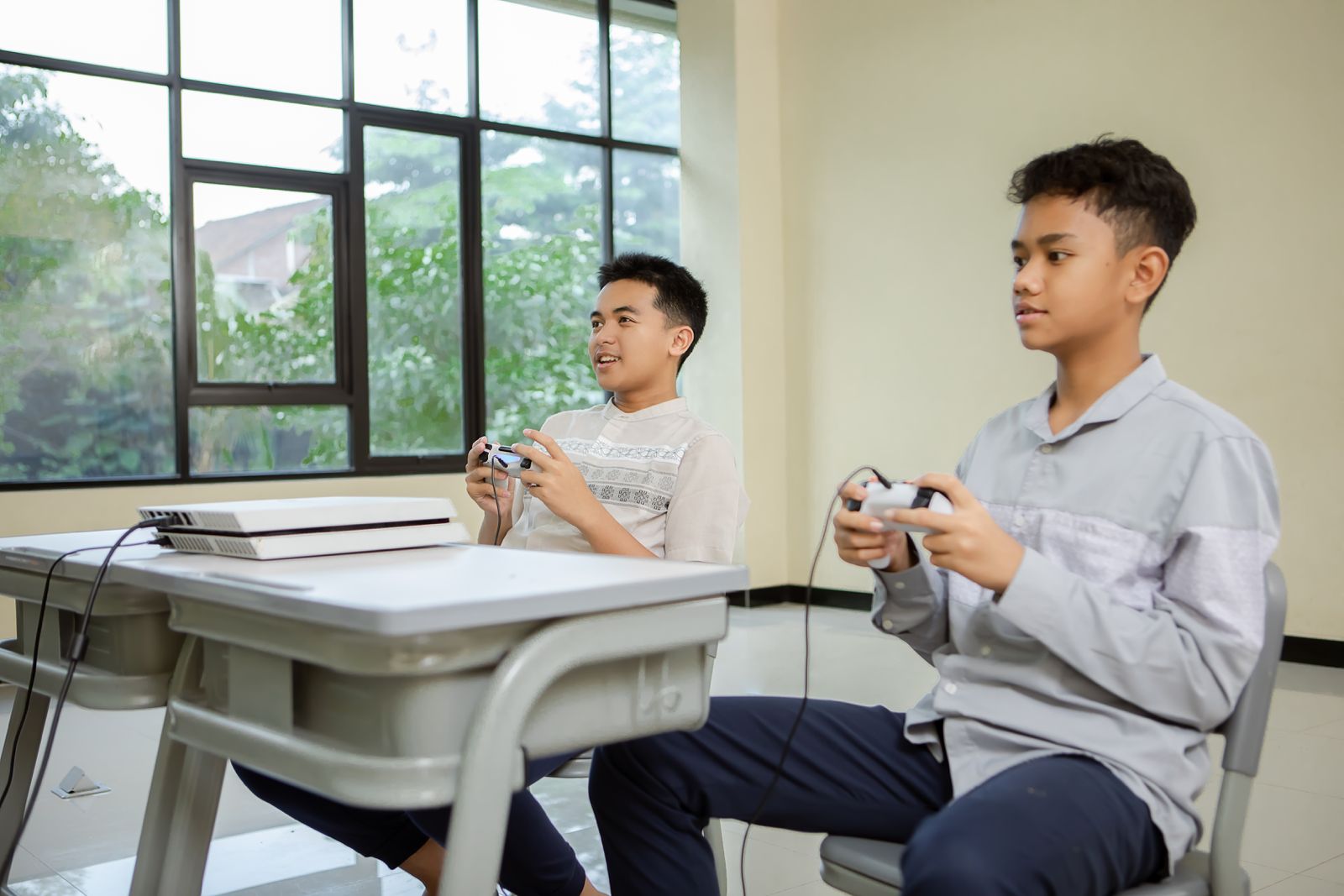 Students placing trophies on shelves